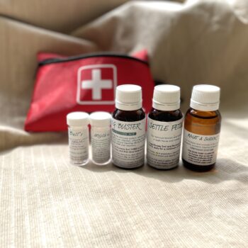 Red First Aid Pouch with 5 homeopathic/herbal and flower remedy vials in front
